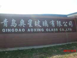 青島奧星玻璃有限公司26噸鋼化爐吊裝拖拉就位現(xiàn)場